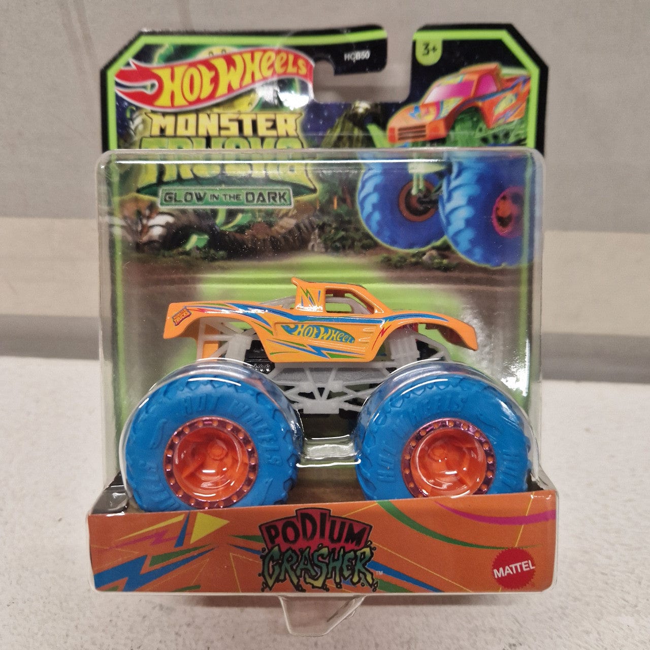 Hot Wheels Monster Trucks Glow In The Dark Podium Crasher 2023 Packaging Hot Wheels Monster Trucks Glow In The Dark Podium Crasher 2023 Packaging