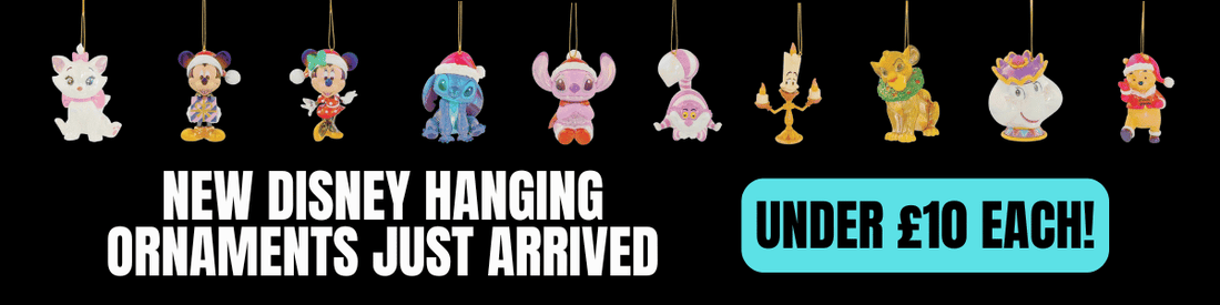 A promotional banner showing a row of hanging Disney-themed ornaments on a black background, with text reading 'NEW DISNEY HANGING ORNAMENTS JUST ARRIVED' and 'UNDER £10 EACH!'.
