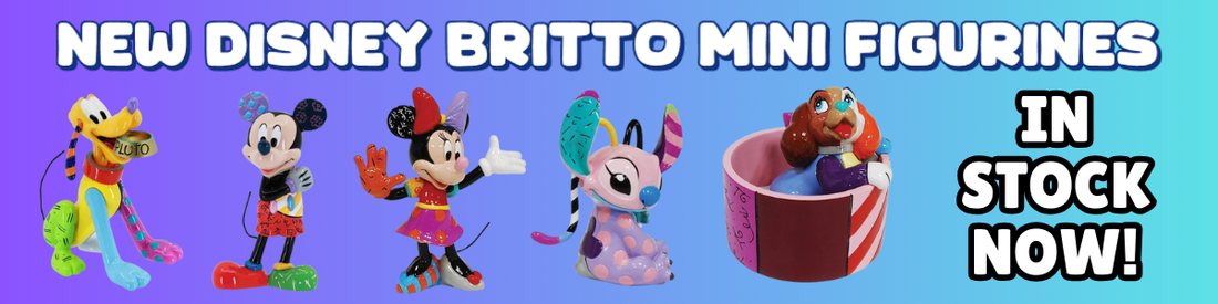 Five colorful Disney Britto mini figurines of Pluto, Mickey, Minnie, Stitch, and Lady are displayed on a blue to purple gradient background with bold text: New Disney Britto Mini Figurines In Stock Now!.
