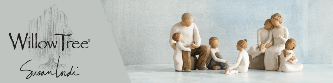 Wooden figurines of a family, including adults and children, sit and interact together. Willow Tree and Susan Lordi are written on the left side over a tree illustration.