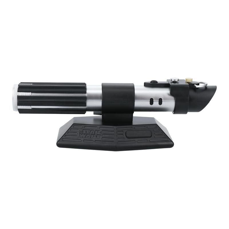 The Star Wars Lightsaber Uplighter by Paladone is an officially licensed silver and black hilt replica, inspired by Darth Vader, displayed horizontally on a black stand with the Star Wars logo embossed on the base.