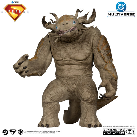 The McFarlane Toys DC Multiverse Kaiju Superman Movie action figure is a large, tan, horned, lizard-like humanoid with Ultra Articulation. Features logos for DC, Superman, and McFarlane Toys.