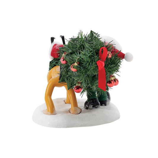 The Department 56 Disney Mickey’s Perfect Tree Figurine features Mickey and Minnie dressed as Santa, tangled in a large ornamented wreath with only their legs and Santa hats visible, creating a whimsical holiday scene on snowy ground.