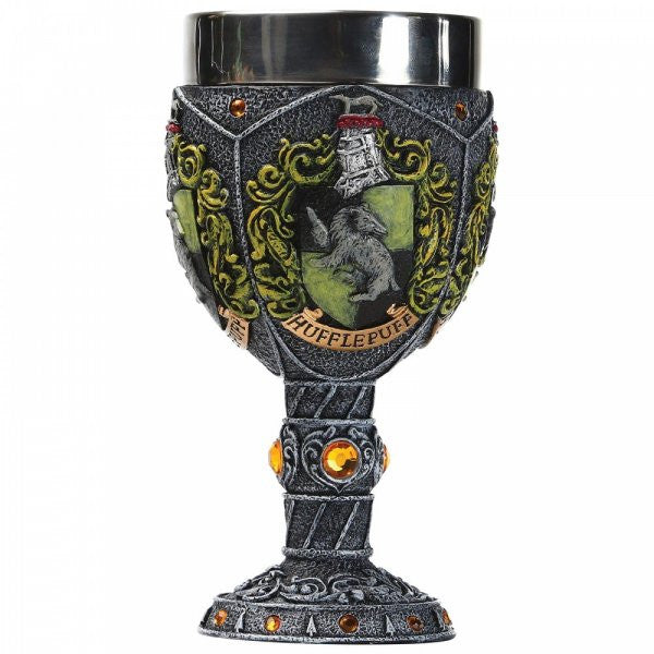 The Wizarding World of Harry Potter Hufflepuff Decorative Goblet features a silver-colored cup, yellow gemstones, and an intricate design with the Hufflepuff crest—showing a badger and the word Hufflepuff on a banner.