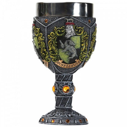 The Wizarding World of Harry Potter Hufflepuff Decorative Goblet features a silver-colored cup, yellow gemstones, and an intricate design with the Hufflepuff crest—showing a badger and the word Hufflepuff on a banner.