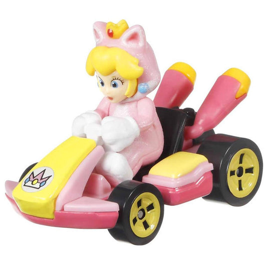 The Hot Wheels Mario Kart Cat Peach Standard Kart features Princess Peach in a pink cat costume, driving a pink and yellow kart with crown emblem, black wheels with yellow rims, and pink exhaust pipes—perfect for Hot Wheels fans!.