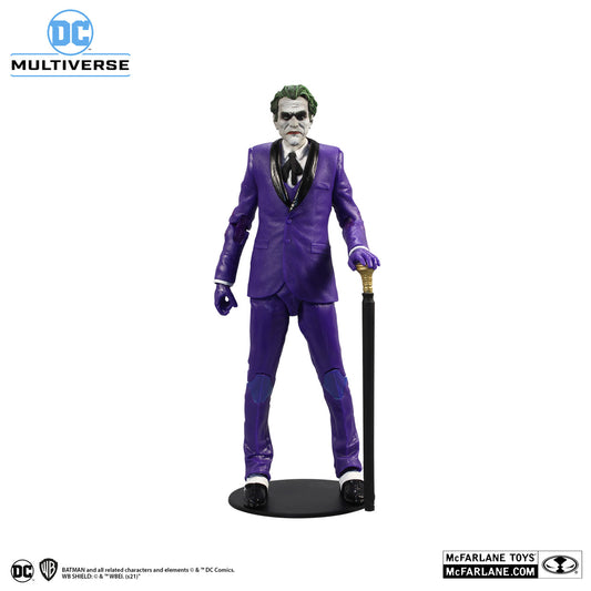 The McFarlane Toys DC Multiverse Joker The Criminal The Three Jokers 30139 features The Joker in a purple suit on a black base, holding a black cane with gold handle, green hair, and white face paint, capturing his iconic look.