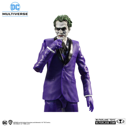 McFarlane Toys DC Multiverse Joker The Criminal (The Three Jokers 30139) action figure in a purple suit with black accents, holding one hand to his mouth. Batman and McFarlane Toys logos appear in the image corners.