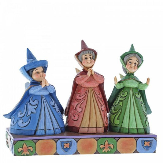 Disney Traditions The three fairies from Sleeping Beauty stand in a row figurine