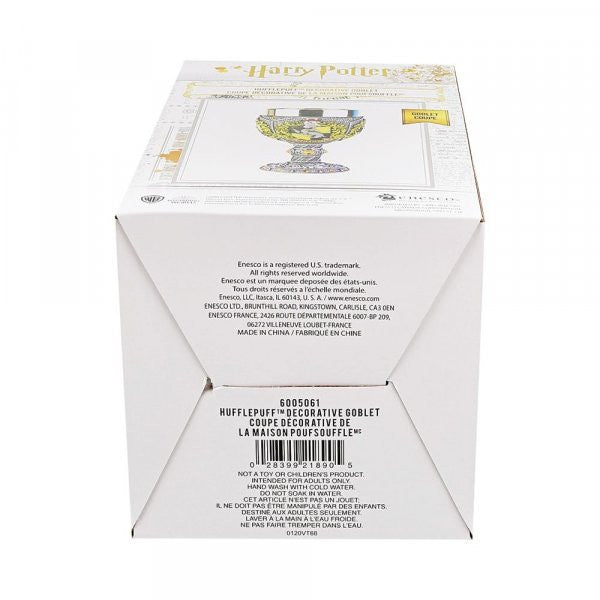 A white box featuring The Wizarding World of Harry Potter branding and a Hufflepuff decorative goblet illustration. The bottom lists Harry Potter Hufflepuff Decorative Goblet with info in English and French.