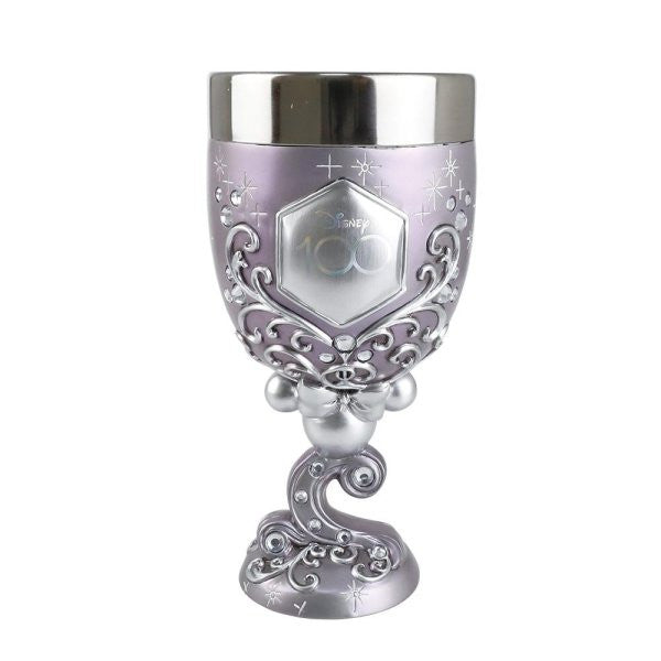 The Enesco Disney 100 Disney Showcase Decorative Goblet (6013123) features ornate swirling designs, the Disney 100th Anniversary logo, and is accented with Mickey Mouse ears and stars on the stem.