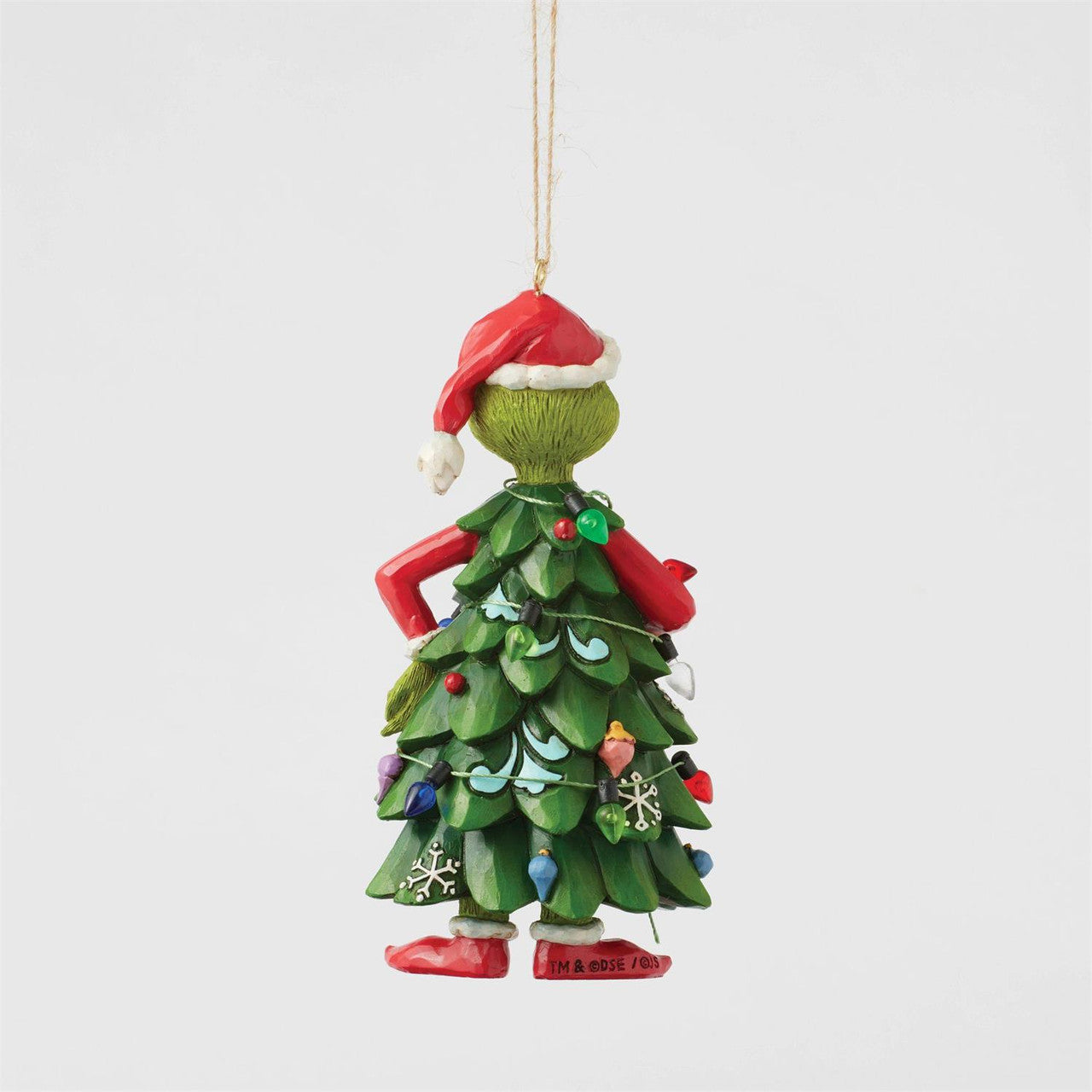 The Grinch By Jim Shore 6017078 is a festive hanging ornament featuring the Grinch dressed as a Christmas tree, complete with ornaments, lights, snowflakes, and a Santa hat—perfect for your holiday decor.