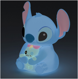 The Stitch with Scrump Light-Up Light by Grand Jester Studios features a glowing blue Stitch in the dark, holding Scrump, with pink inner ears.