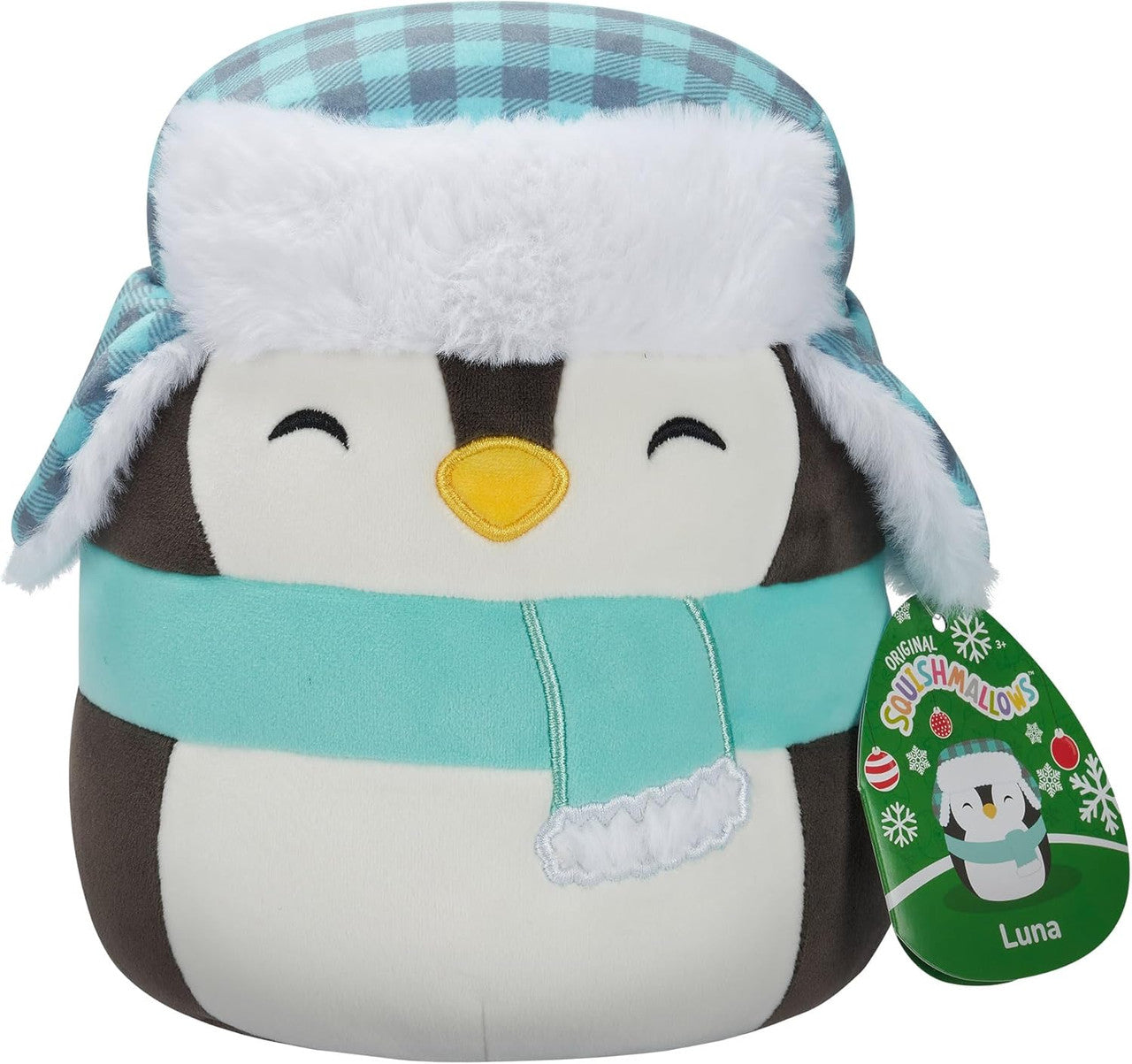 Squishmallows Luna the Black Penguin is a plush toy with a blue plaid winter hat, white fur trim, and matching blue scarf. This smiling, collectible penguin from Squishmallows includes a green tag labeled Luna.