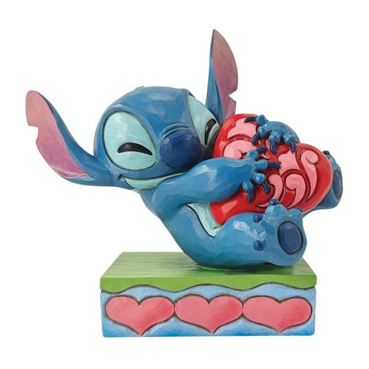 Disney Traditions Stitch Hugging a Heart Figurine 6014316