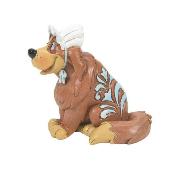 The Disney Traditions Nana Mini Figurine 6014333 features the classic brown dog in a white bonnet with a blue ribbon, cream accents on paws and tail, and decorative blue patterns on its back.