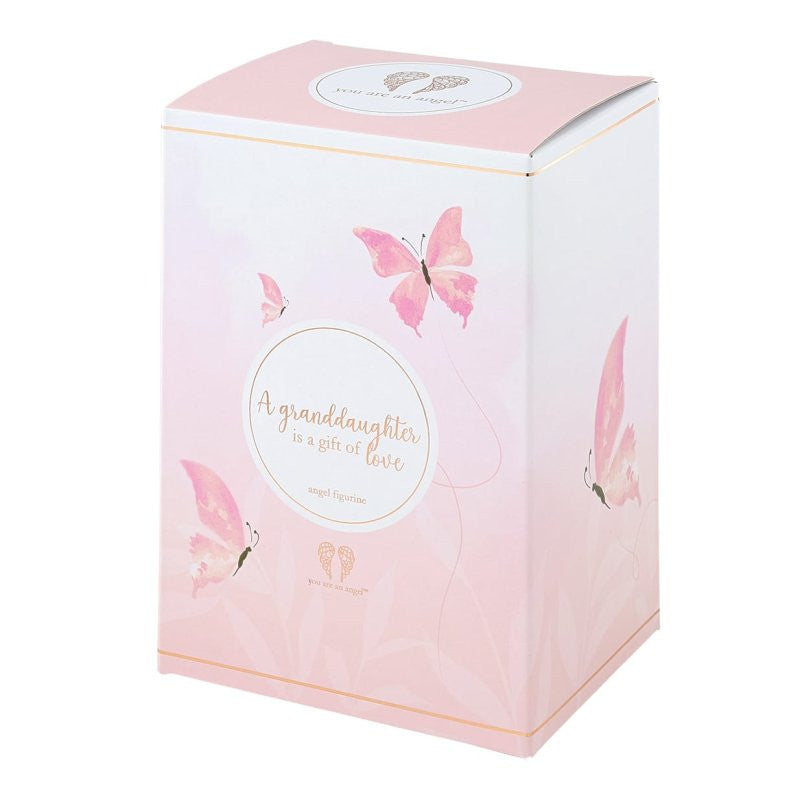 The Granddaughter Angel Figurine AN067 by You Are An Angel comes in a pastel pink and white gift box with watercolor butterflies and “A granddaughter is a gift of love” on the front—ideal for gifting or as a charming, feminine decor piece.