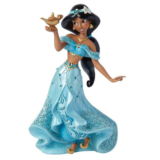 The Disney Traditions Deluxe Jasmine Figurine by Jim Shore (6015014) features Princess Jasmine in her blue outfit, holding a golden lamp and smiling with her left hand extended.