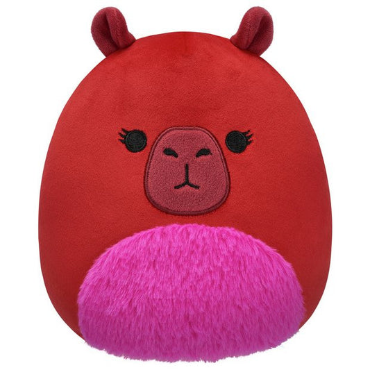 The Squishmallows 7.5 Marcia the Maroon Capybara is a round, maroon plush toy with ultrasoft fabric, two small ears, black eyes, a pink snout, and a fluffy pink patch on its lower front, featuring a cute animal face design.