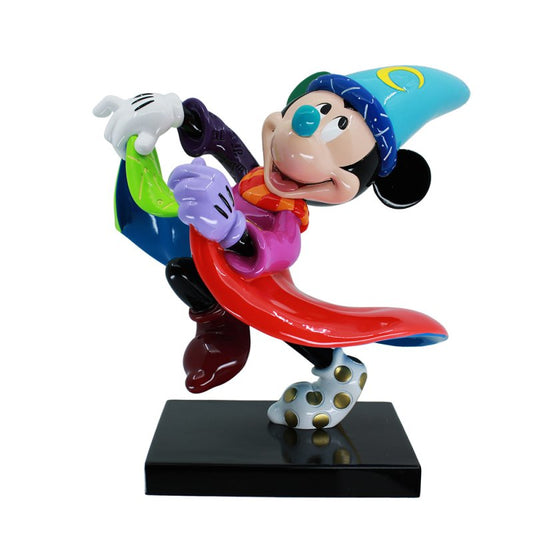 Celebrate Fantasia with the Enesco Disney Britto Sorcerer Mickey Mouse Figurine 6017586, featuring Mickey in a vibrant wizard outfit with a blue crescent moon hat and standing on a black base—a perfect tribute for any fan.