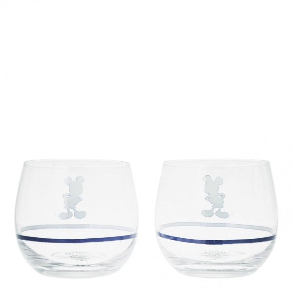 The Disney Home Mono Mickey & Minnie Tumblers (Set of 2) A30845 feature clear glass, a subtle blue stripe near the base, and an outline silhouette of Mickey on each. Perfect for any Disney fan. White background shown.