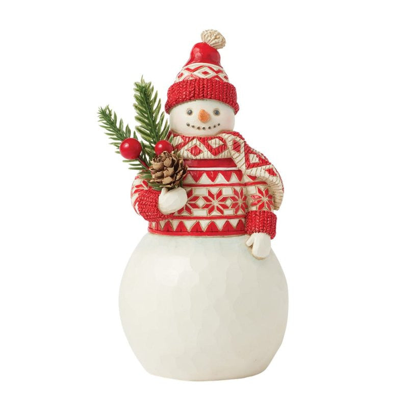 The Heartwood Creek By Jim Shore An Evergreen Twist Snowman With Branch Figurine (6017045) features a festive snowman holding a branch—an ideal Christmas decoration to add charm to your holiday décor.