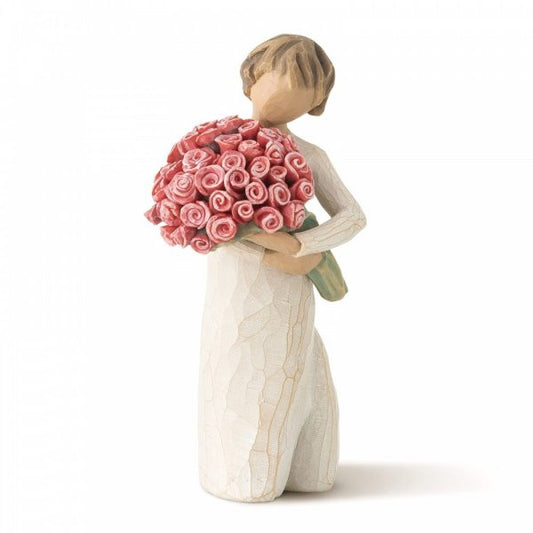 Willow Tree figurine of a girl holding flowers