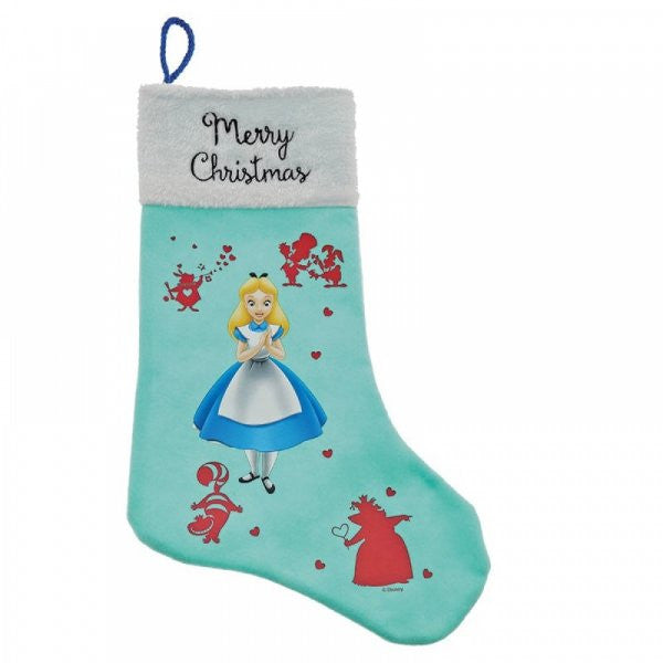 The Disney Enchanting Alice In Wonderland Christmas Stocking (A30226) features Alice on light blue fabric with a soft faux fur trim and white cuff reading Merry Christmas, accented by red characters and hearts—a charming, whimsical gift.