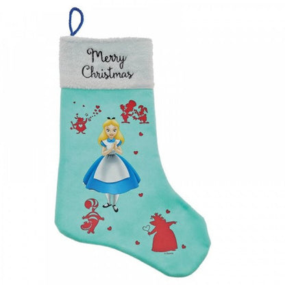 The Disney Enchanting Alice In Wonderland Christmas Stocking (A30226) features Alice on light blue fabric with a soft faux fur trim and white cuff reading Merry Christmas, accented by red characters and hearts—a charming, whimsical gift.