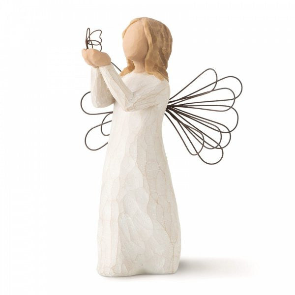 Willow Tree Figurine of a girl holding a butterfly and the sentiment allowing dreams to soar