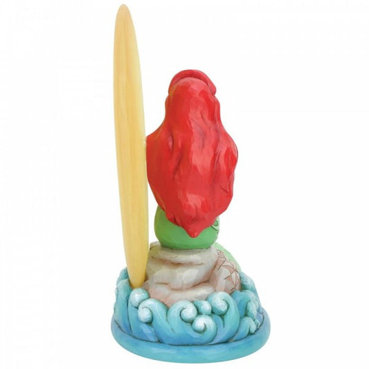 Disney Traditions Ariel (The Little Mermaid) Sits on a rock n front of a light-up moon figurine