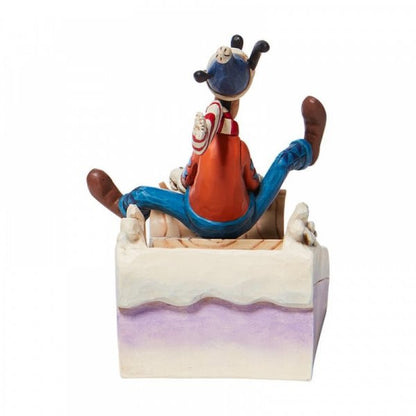 Disney Traditions Goofy Sledding Figurine