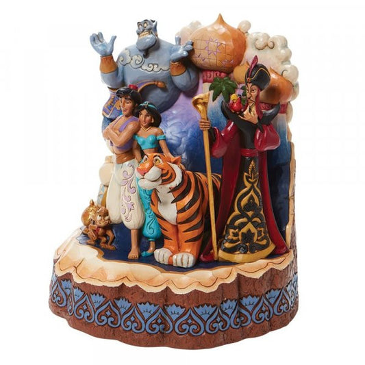 Disney Traditions Aladdin ,Jasmine take center stage as Abu, Rajah, and the Sultan smile close by. The magic carpet, lamp, Genie, and Jafar peer pointedly from the breath-taking Arabian city Carved by Heart Figurine