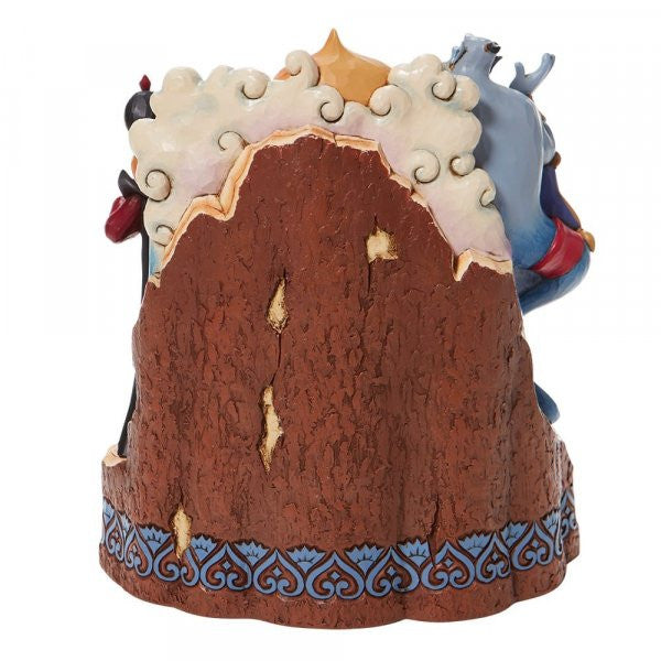 Disney Traditions Aladdin ,Jasmine take center stage as Abu, Rajah, and the Sultan smile close by. The magic carpet, lamp, Genie, and Jafar peer pointedly from the breath-taking Arabian city Carved by Heart Figurine