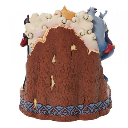 Disney Traditions Aladdin ,Jasmine take center stage as Abu, Rajah, and the Sultan smile close by. The magic carpet, lamp, Genie, and Jafar peer pointedly from the breath-taking Arabian city Carved by Heart Figurine