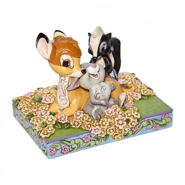Disney Traditions Bambi, Thumper and Flower resting together in amongst the flowers Figurine