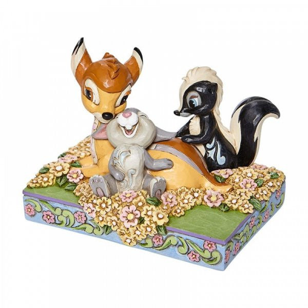 Disney Traditions Bambi, Thumper and Flower resting together in amongst the flowers Figurine