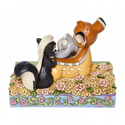 Disney Traditions Bambi, Thumper and Flower resting together in amongst the flowers Figurine