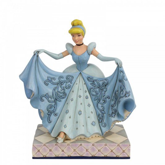 Disney Traditions Cinderella curtsies in her beautiful ball gown figurine