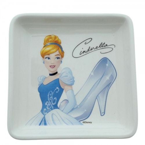 The Disney Enchanting Cinderella Trinket Tray by Disney Enchanting is a square ceramic dish featuring Cinderella in her blue gown and gloves, alongside a glass slipper and her signature—perfect for any Disney princess fan.