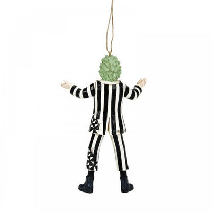 The Beetlejuice By Jim Shore Classic Hanging Ornament (6016179) features the iconic figure with green hair in a black and white striped suit and boots, arms outstretched, facing away from the viewer.