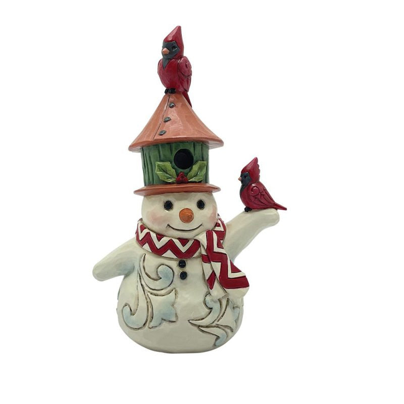 The Heartwood Creek By Jim Shore Snowman With Birdhouse Hat Mini Figurine (6017276) features a whimsical birdhouse hat with two red cardinals, plus a red and white scarf—an ideal festive accent from Heartwood Creek by Jim Shore for winter decor.