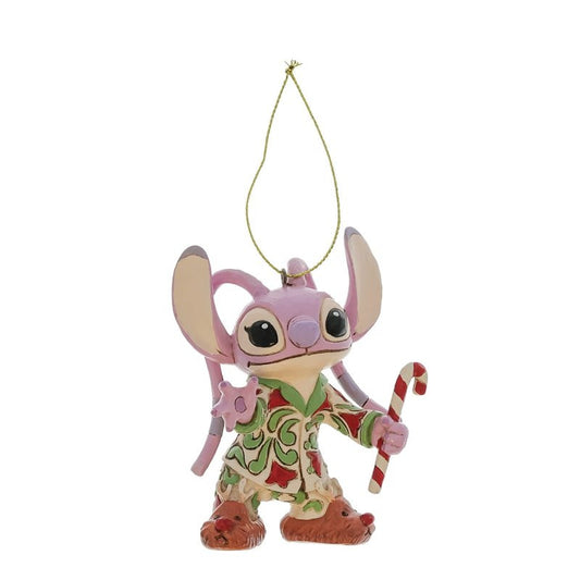 The Disney Traditions Angel In Christmas PJs Hanging Ornament by Jim Shore (6017544) features the pink alien mouse Angel in festive pajamas, holding a candy cane, with large ears and a string for hanging.