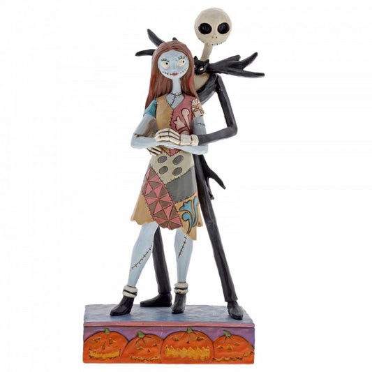 Disney Traditions Jack Skellington and Sally from Disney's The Nightmare Before Christmas in a warm embrace figurine