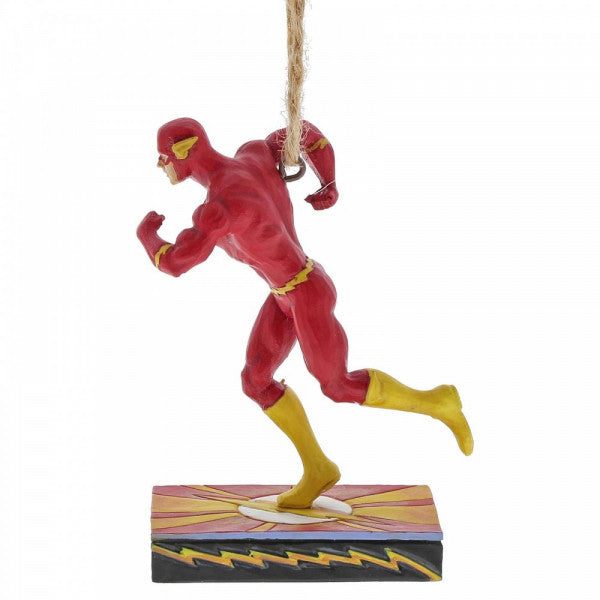 The DC The Flash Silver Age Hanging Ornament by Jim Shore features The Flash in his red suit with yellow boots, running atop a lightning-themed base. This DC Comics by Jim Shore collectible is perfect for Justice League fans to hang and display.