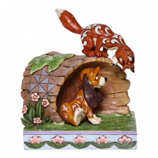 Disney Traditions Fox and Hound playing on a log figurine