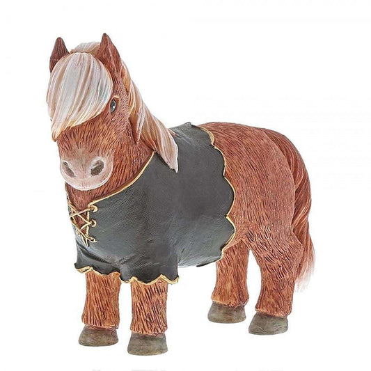 The Enesco Border Fine Arts Countryside Couture Gordon The Highland Pony Figurine, featuring a brown pony in a black medieval-style cloak with gold trim and lace-up detail, is displayed on a white background.