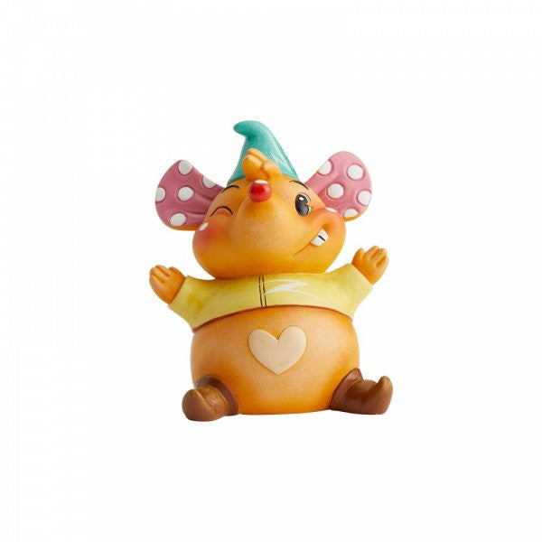 The World of Miss Mindy Presents Disney Jaq and Gus Gus Figurine (6003770) features a hand-painted, whimsical mouse with pink polka-dot ears, a green hat, yellow shirt, heart on its belly, outstretched arms, smiling and winking.