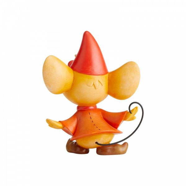 The World of Miss Mindy Presents Disney Jaq and Gus Gus Figurine (6003770) features a small hand-painted mouse with large yellow ears, red hat and dress, brown shoes, and black tail, seen from behind on a plain white background.