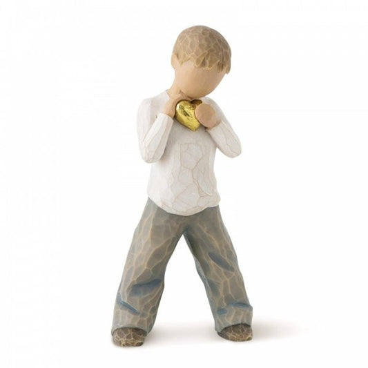 Willow Tree Figurine showing a boy holding a gold heart
